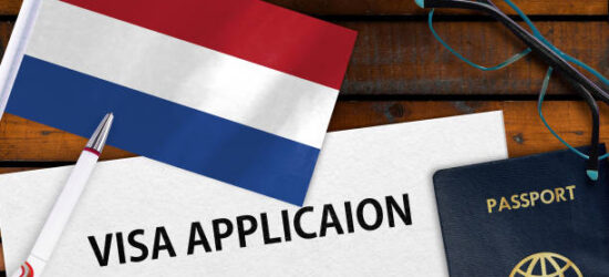 Flag of Netherlands, visa application form and passport on table